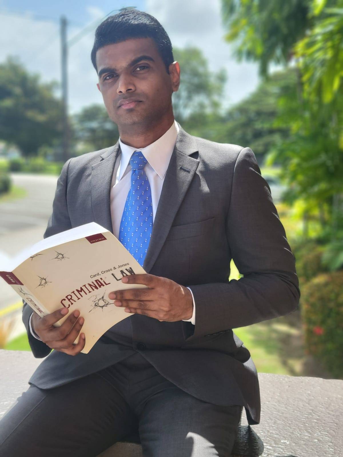 Detail portrait of Dmitri Mohammed reviewing affidavits